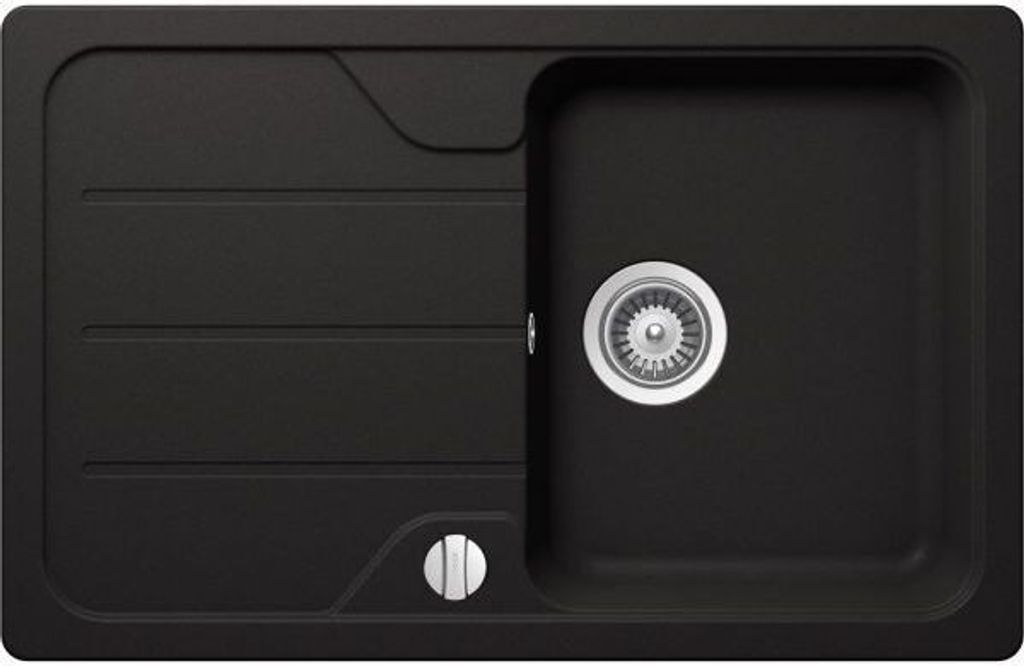 A top-down view of a black kitchen sink with a silver drain.