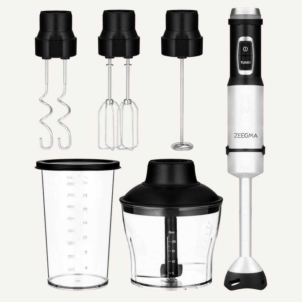 A collection of kitchen blender attachments and the blender base are arranged on a light gray background.