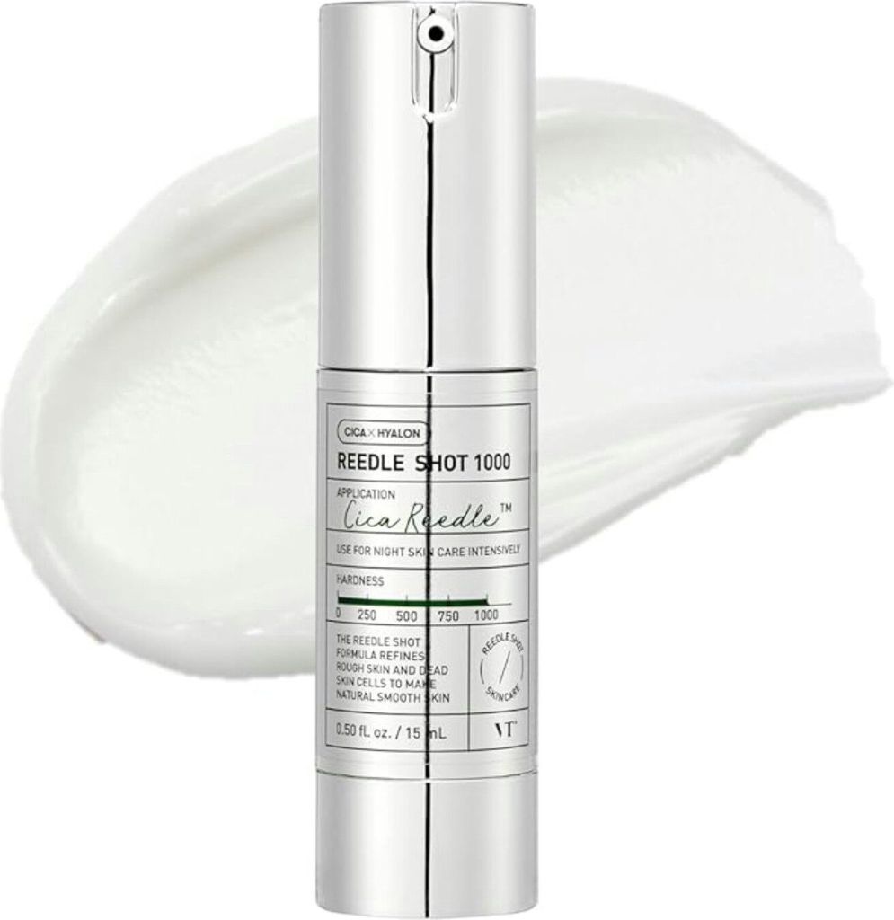 A silver bottle of VT Cosmetics Reedle Shot 1000 serum is shown against a white background with a smear of white cream.