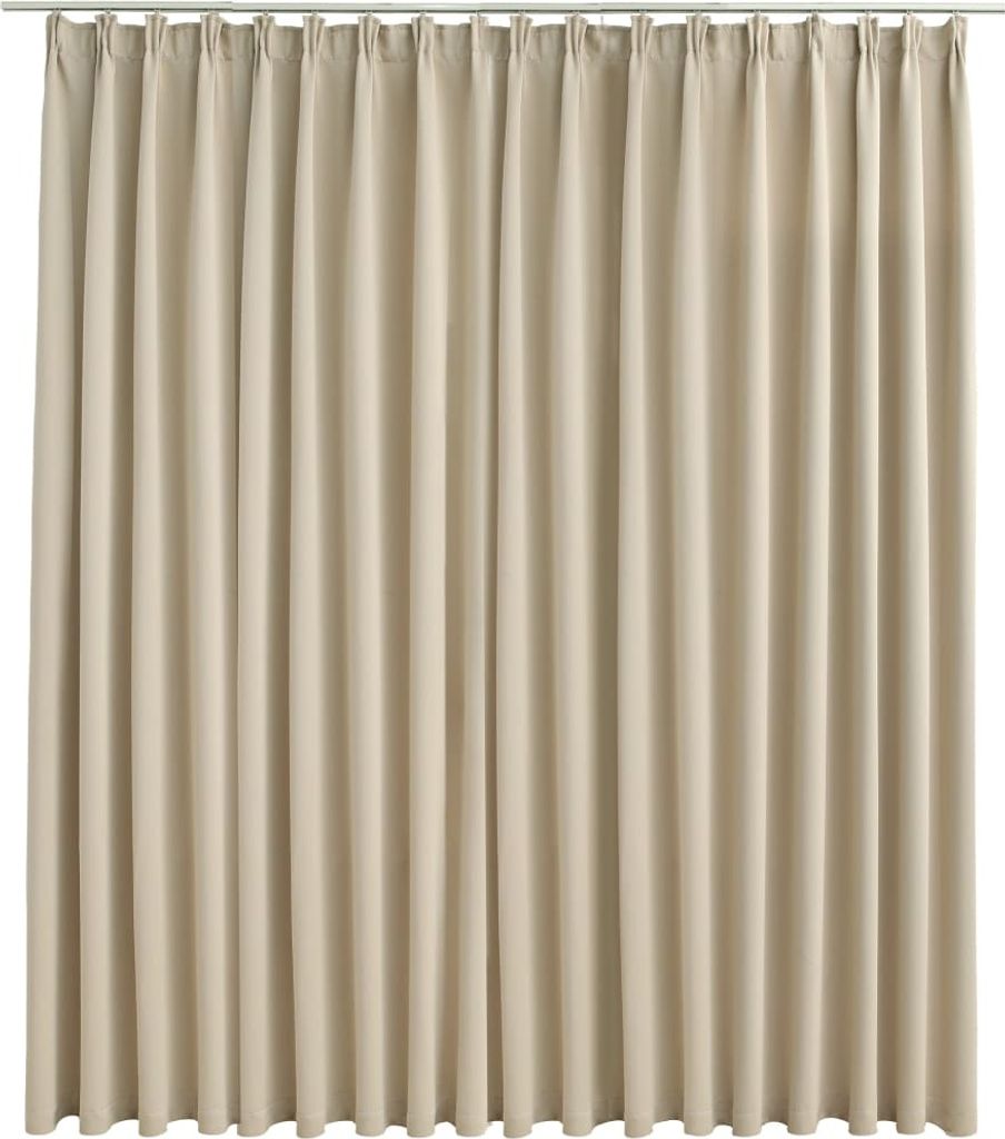 A full-frame shot of a beige curtain hanging from a rod.