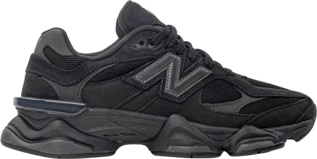 A black New Balance sneaker shown from the side.