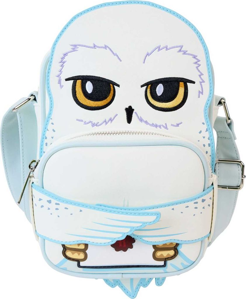 A white owl-shaped crossbody bag with blue trim and embroidered facial features.