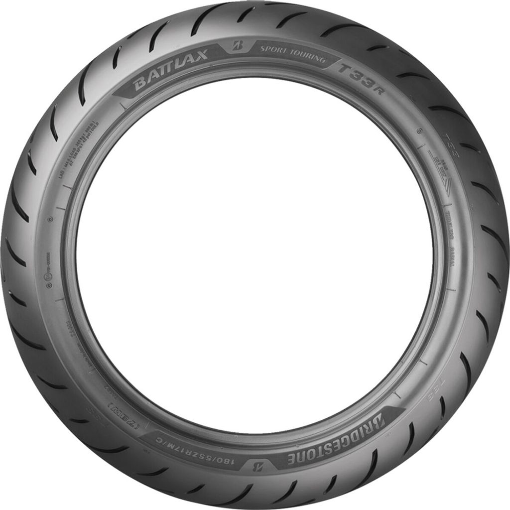 A single motorcycle tire shown from the front, isolated on a white background.