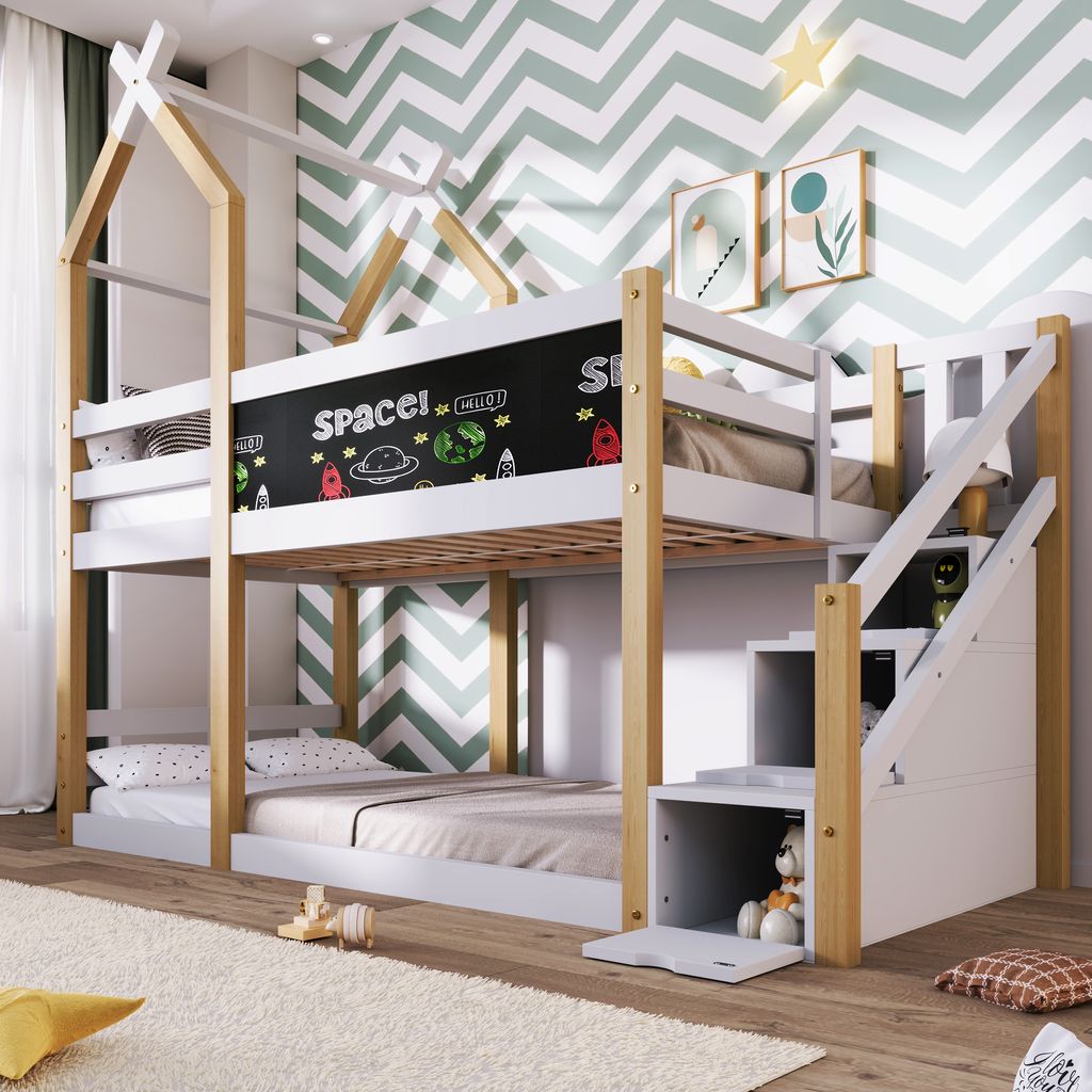 A children's bunk bed with a house-shaped frame and a chalkboard section, decorated with space-themed drawings.