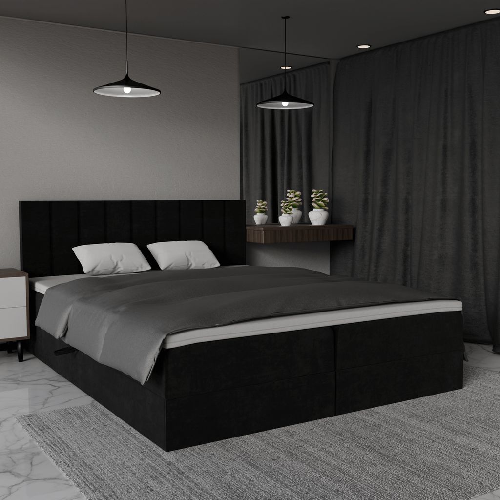 A bedroom scene with a black bed.