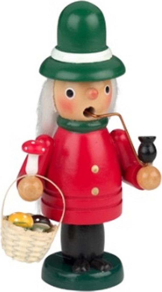 Dies ist ein Räuchermännchen, das Pilze sammelt. Es trägt einen grünen Hut und einen roten Mantel.