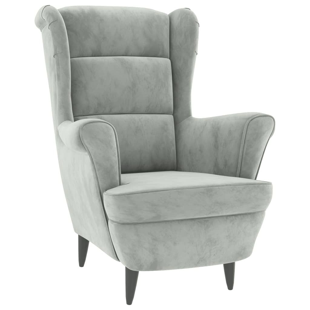 A close-up view of a light gray upholstered armchair.