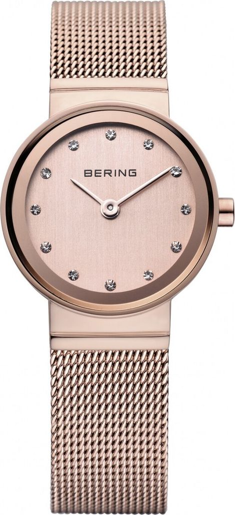 A close-up studio shot of a Bering women's watch with a rose gold mesh strap and a rose gold dial.