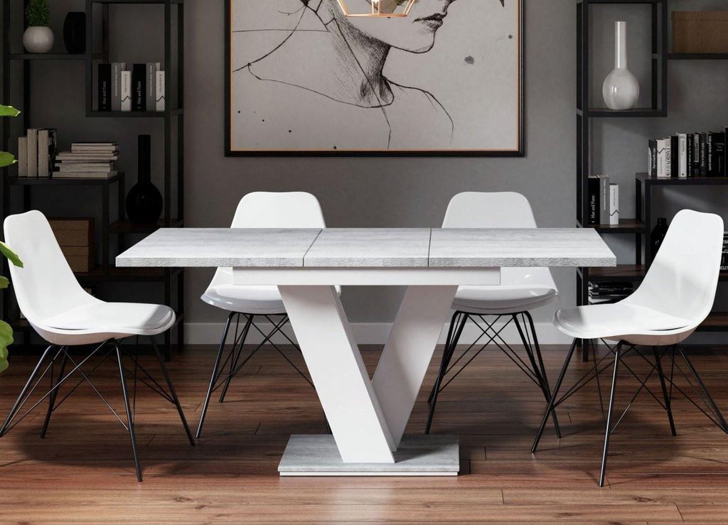A dining room setting with a table and chairs.
