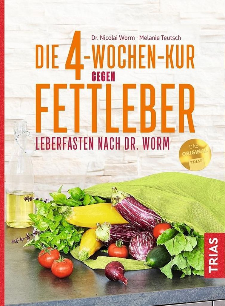 A book cover with text and images of vegetables.