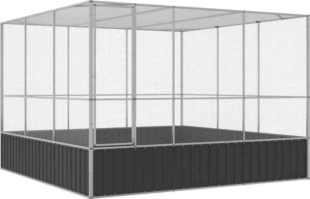 A large, empty aviary or enclosure made of metal frame and mesh, with a solid dark base.