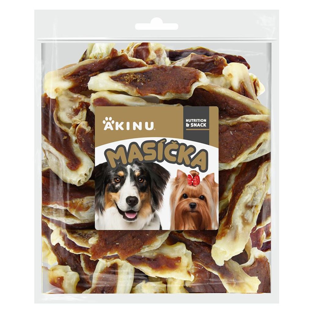 A clear plastic bag filled with dog treats, with a label featuring two dogs and product information.