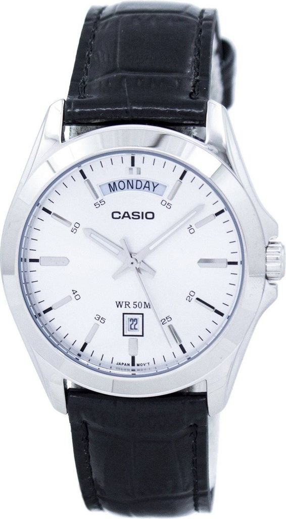 A close-up studio shot of a Casio watch with a white face and black leather strap.