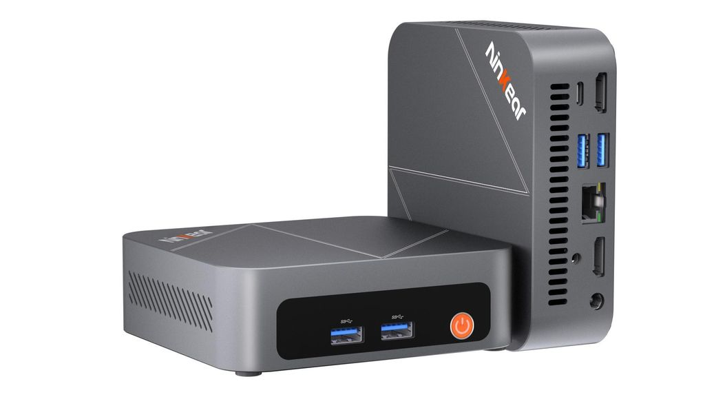 A gray mini PC with a vertical extension, shown against a white background.