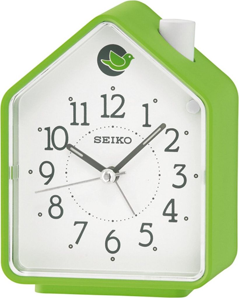 A green house-shaped alarm clock with a white face and black hands.