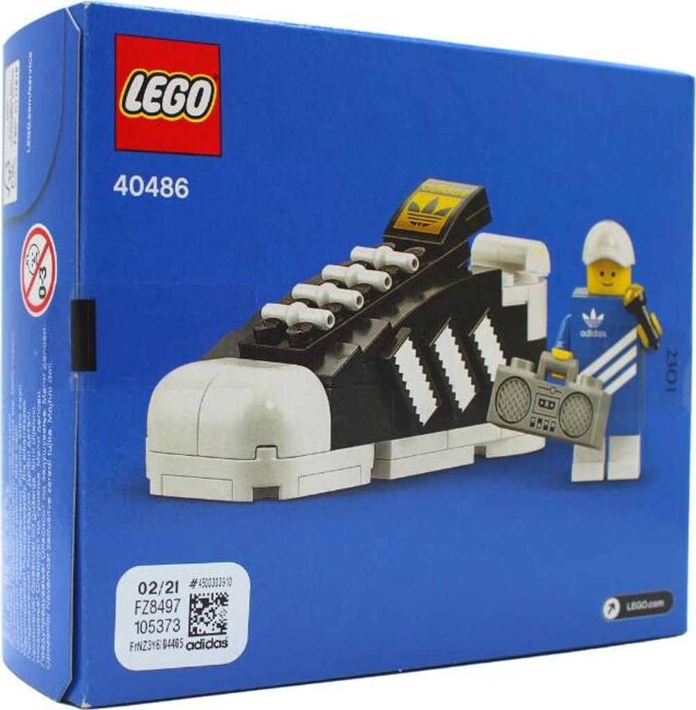 The image shows the packaging of a LEGO set featuring an Adidas Superstar shoe and a minifigure.