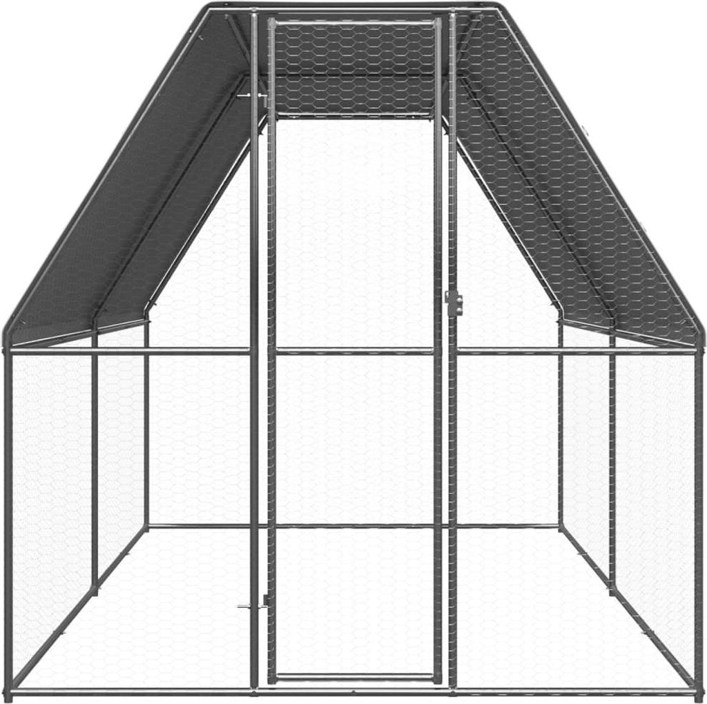 An empty outdoor chicken coop with a pitched roof and a door.