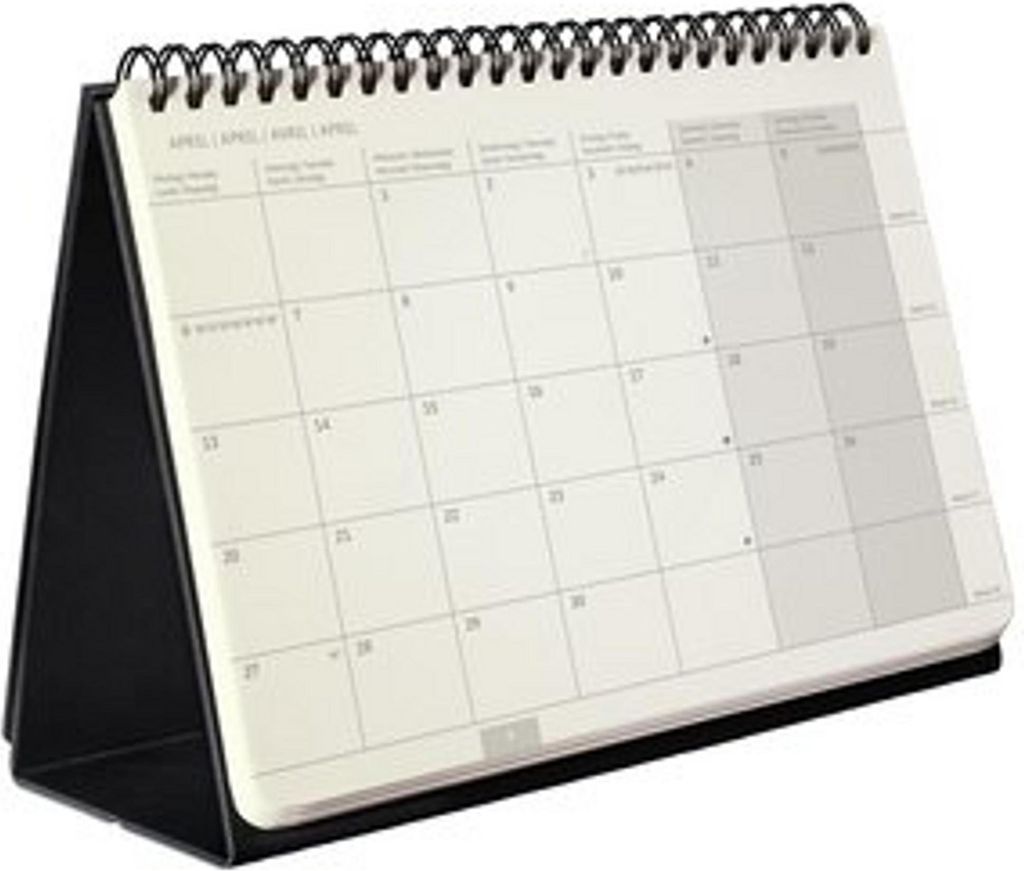 A desk calendar with a black stand.