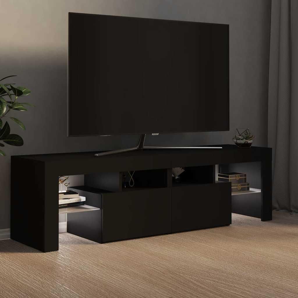 A black TV stand with a TV on top, in a room with a gray wall and curtains.
