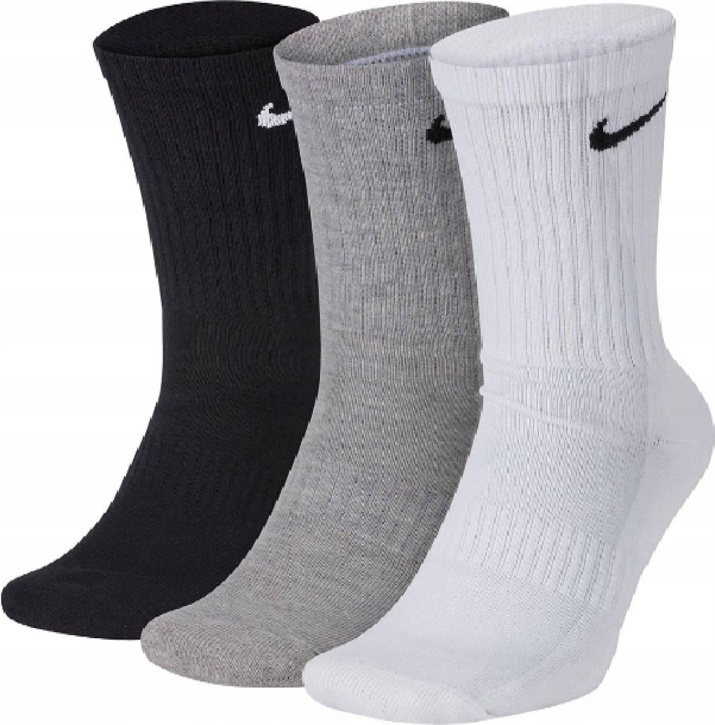 Three pairs of Nike crew socks in black, gray, and white, displayed side-by-side against a white background.