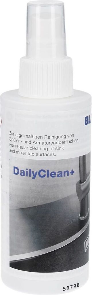 A white spray bottle of cleaning product with a label.