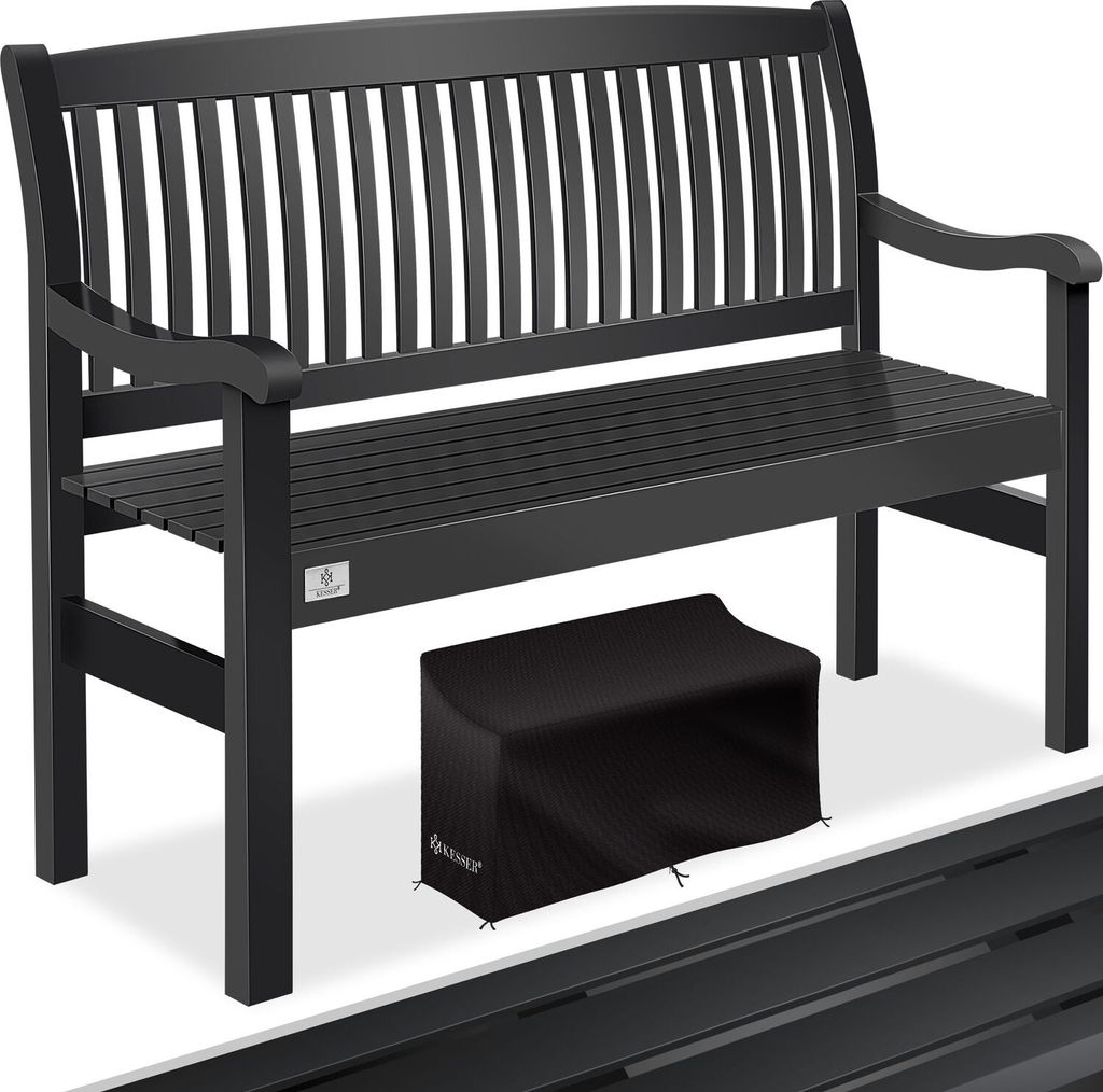 A black garden bench with a black cover for a stool underneath.