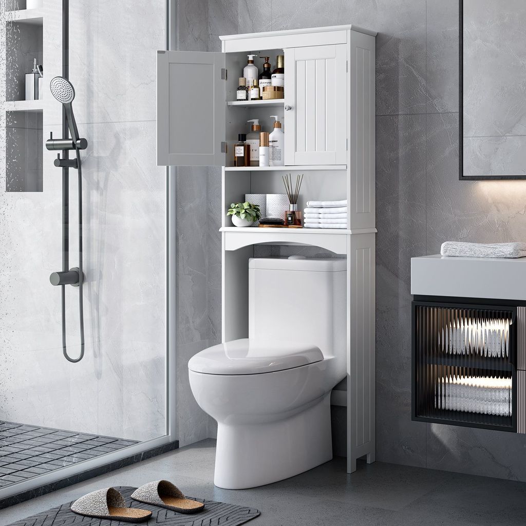 A bathroom scene with a toilet and a white cabinet.