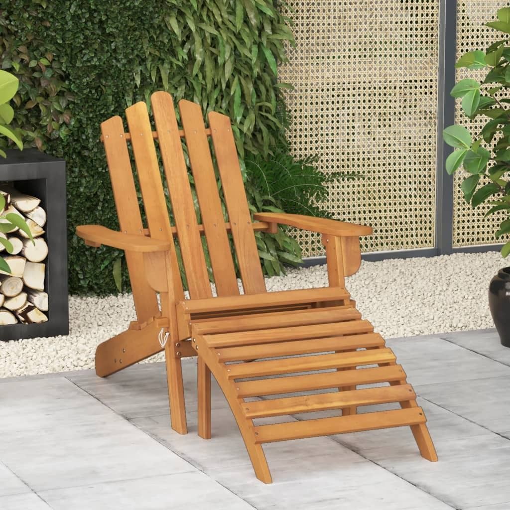An outdoor patio scene with a wooden Adirondack chair and footrest.