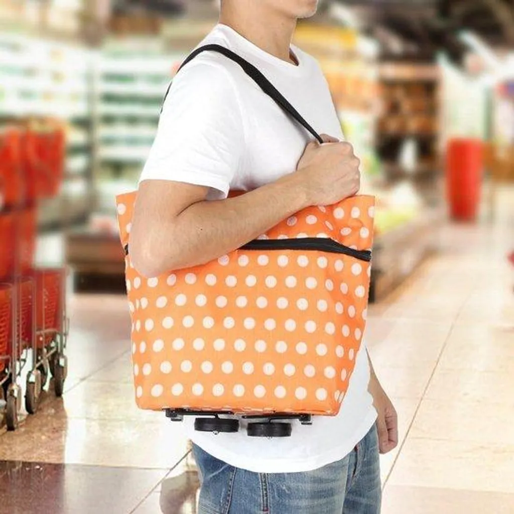 Dites adieu aux sacs lourds avec ce sac à roulettes en Oxford Orange