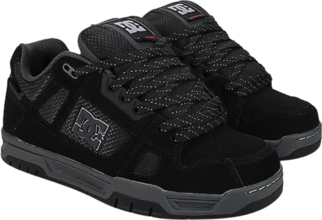 Chaussures de skate montantes DC Stag WNT de couleur noire et grise 42.5