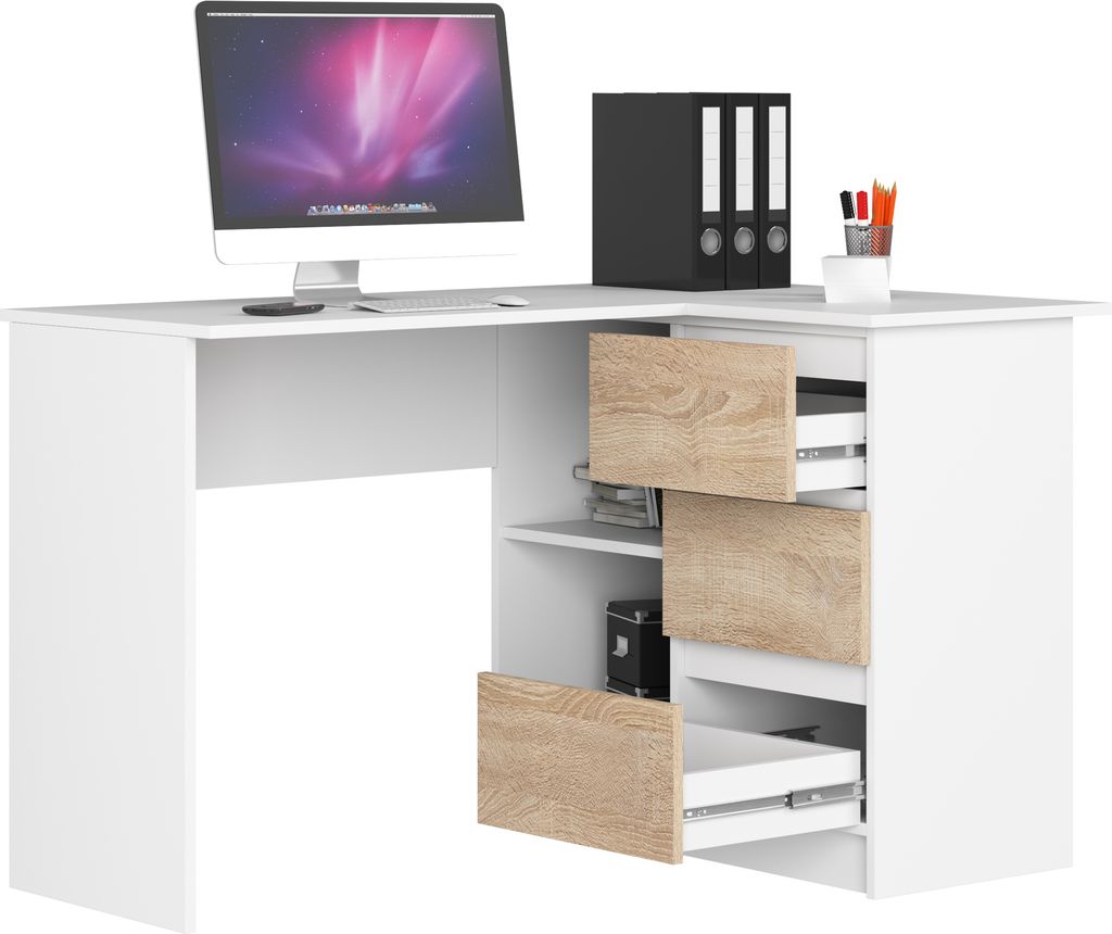 A white corner desk with wood-tone drawer fronts and shelves, featuring a computer monitor, binders, and pens.