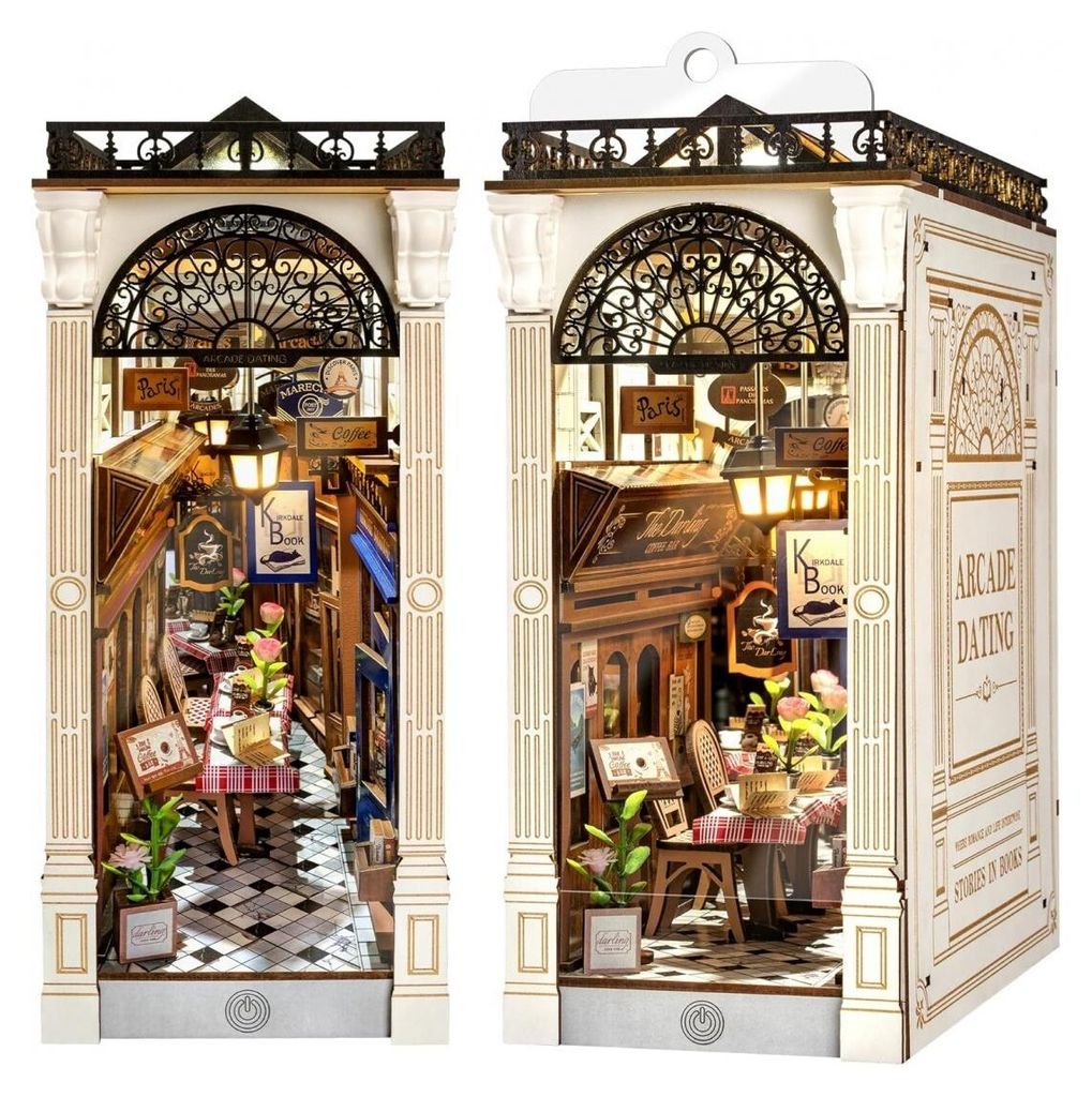 Two miniature book nook dioramas depicting a Parisian-themed arcade dating scene.