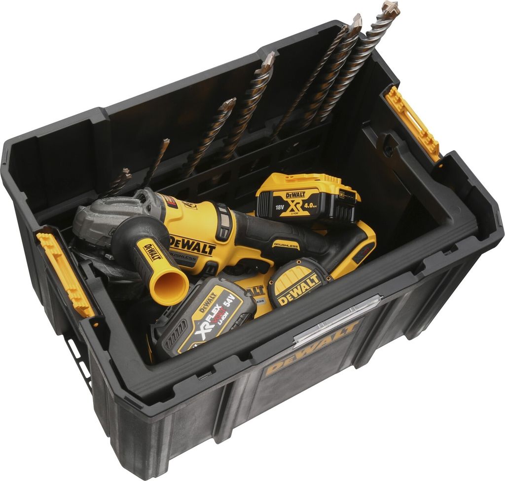 A Dewalt tool box containing an angle grinder, batteries, and drill bits.