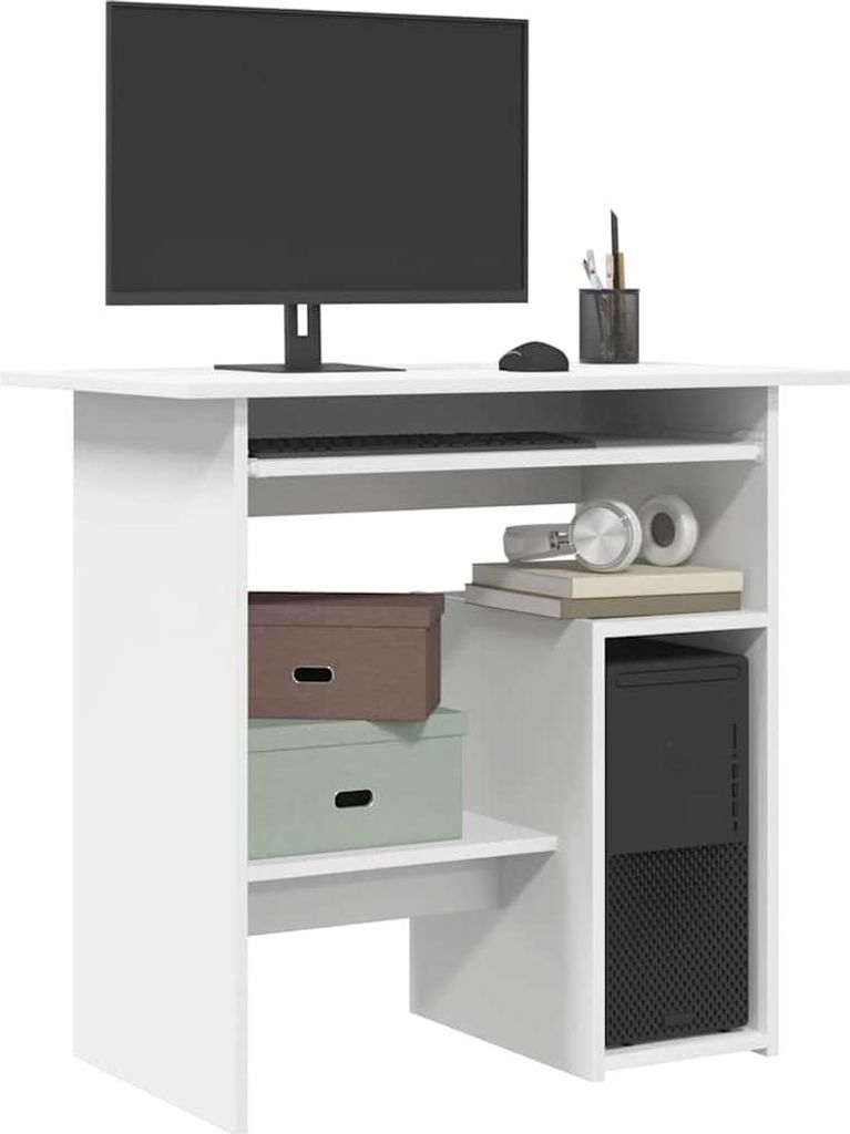 A white desk with a computer monitor, keyboard, mouse, headphones, and storage boxes.