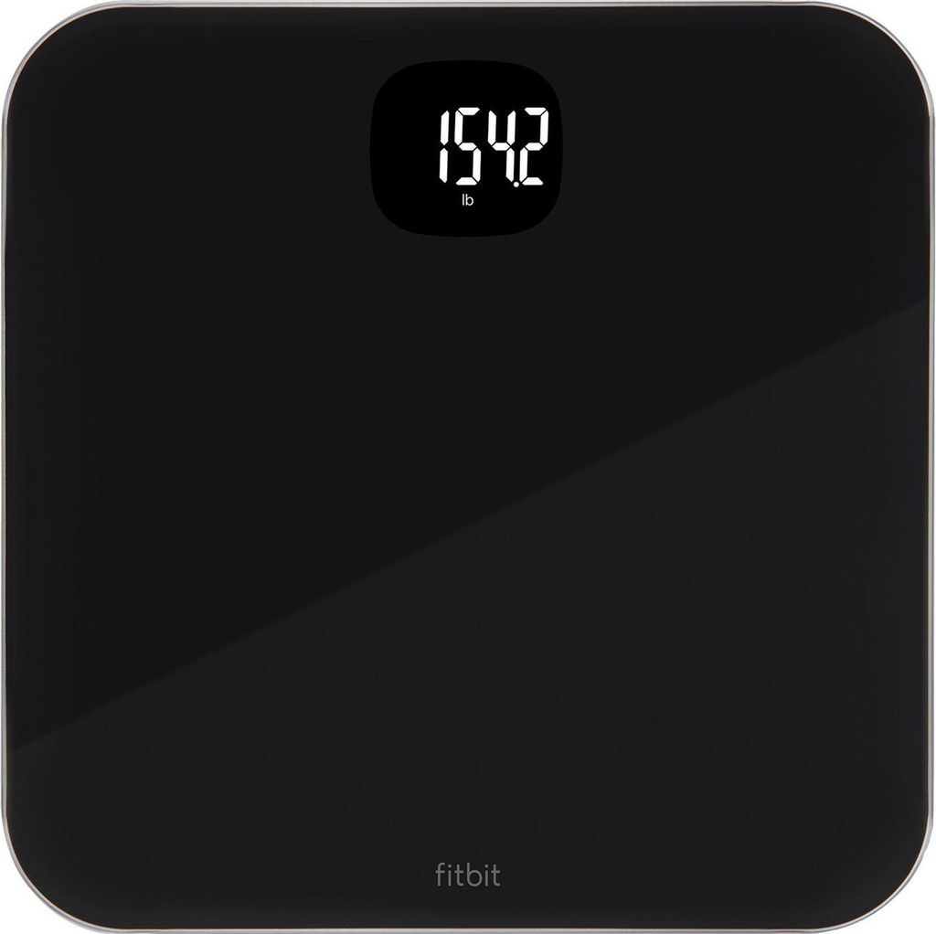 A black Fitbit Aria Air smart scale is shown from a top-down perspective on a white background. The scale displays a weight of 154.2 lbs.