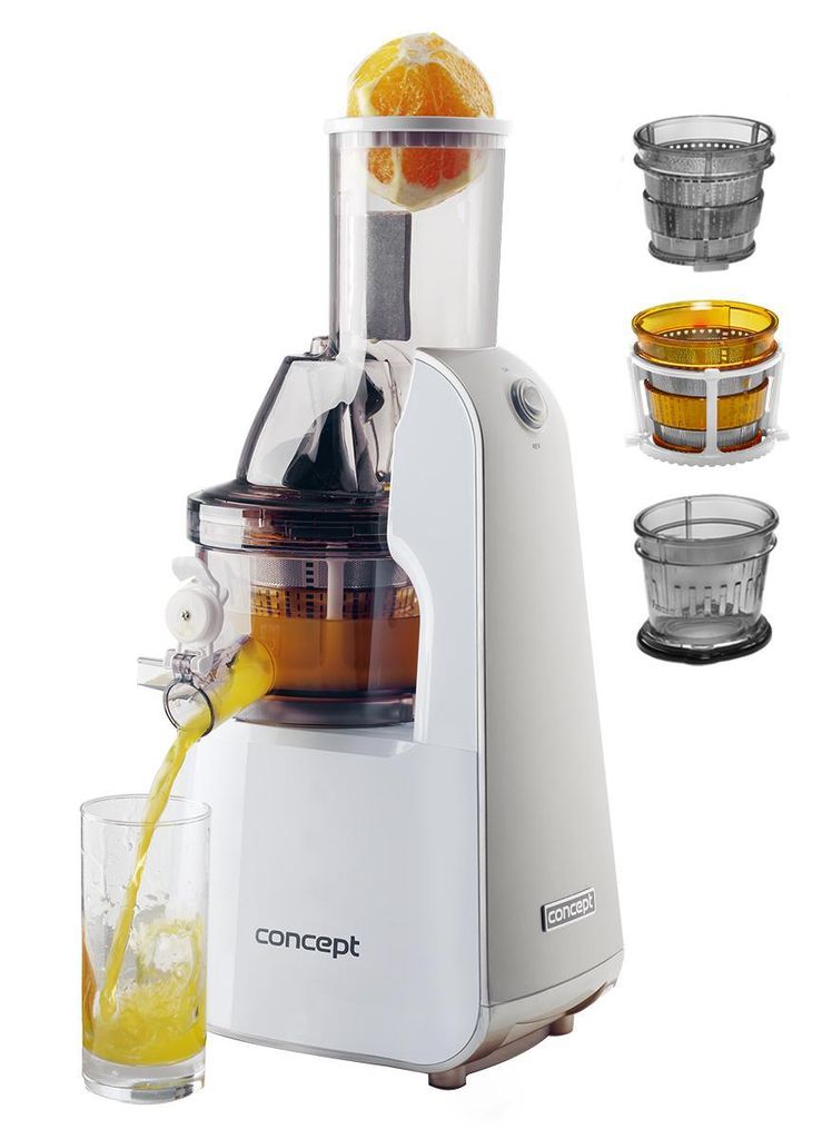 A white slow juicer with an orange slice in the chute, juicing into a glass.