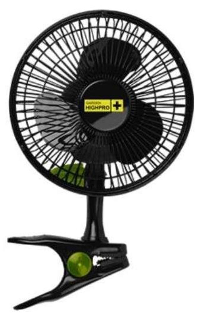 A black clip-on fan with a green accent on the clip.