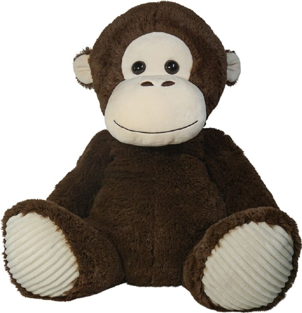 A plush monkey toy is sitting on a white background.
