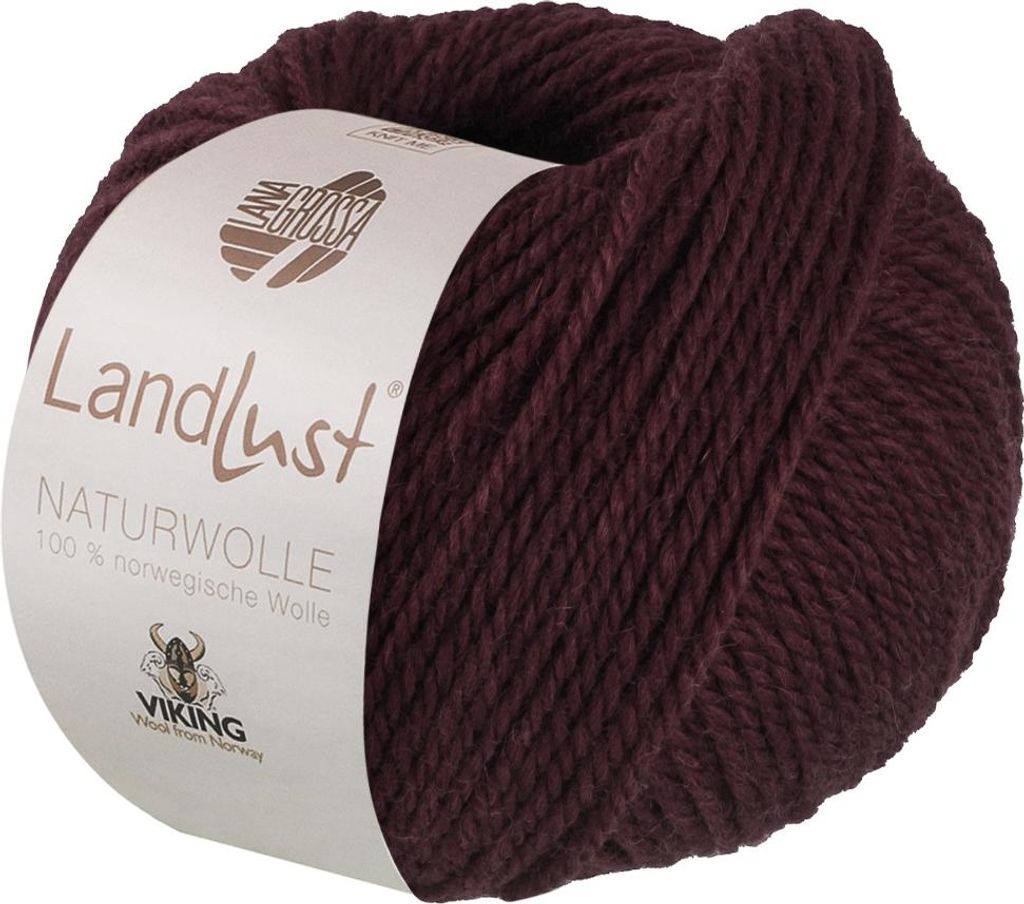 A ball of burgundy yarn with a label.