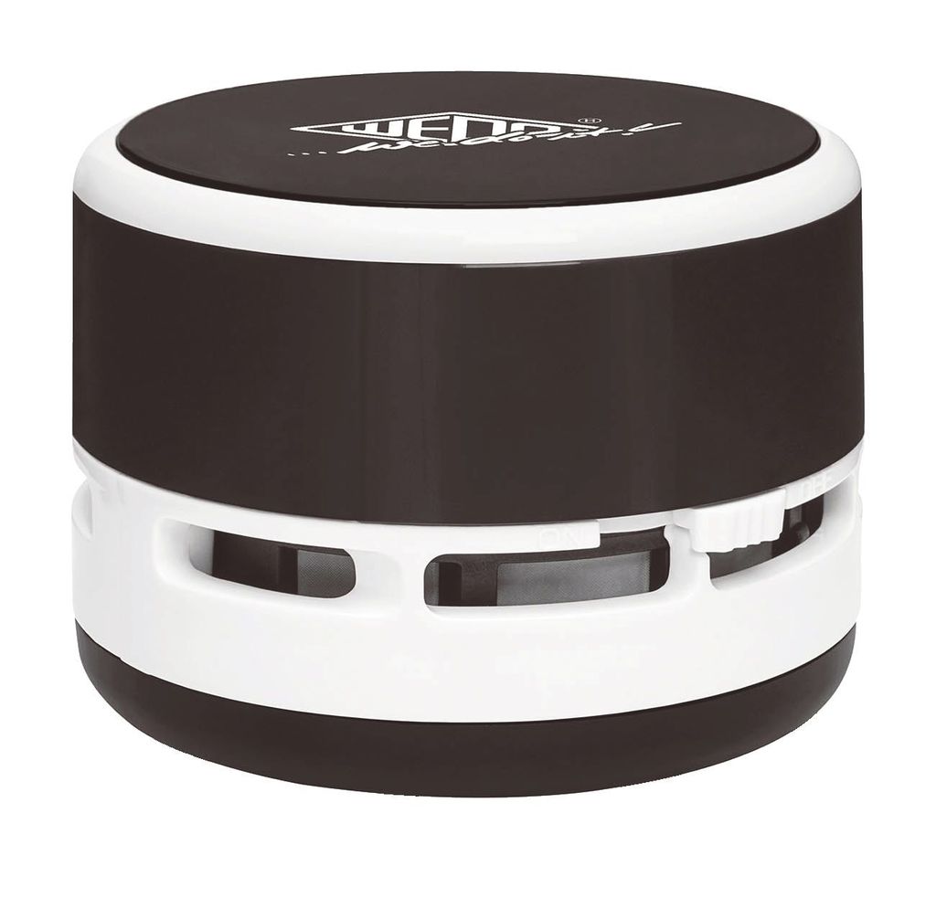 A product shot of a mini desktop vacuum cleaner.