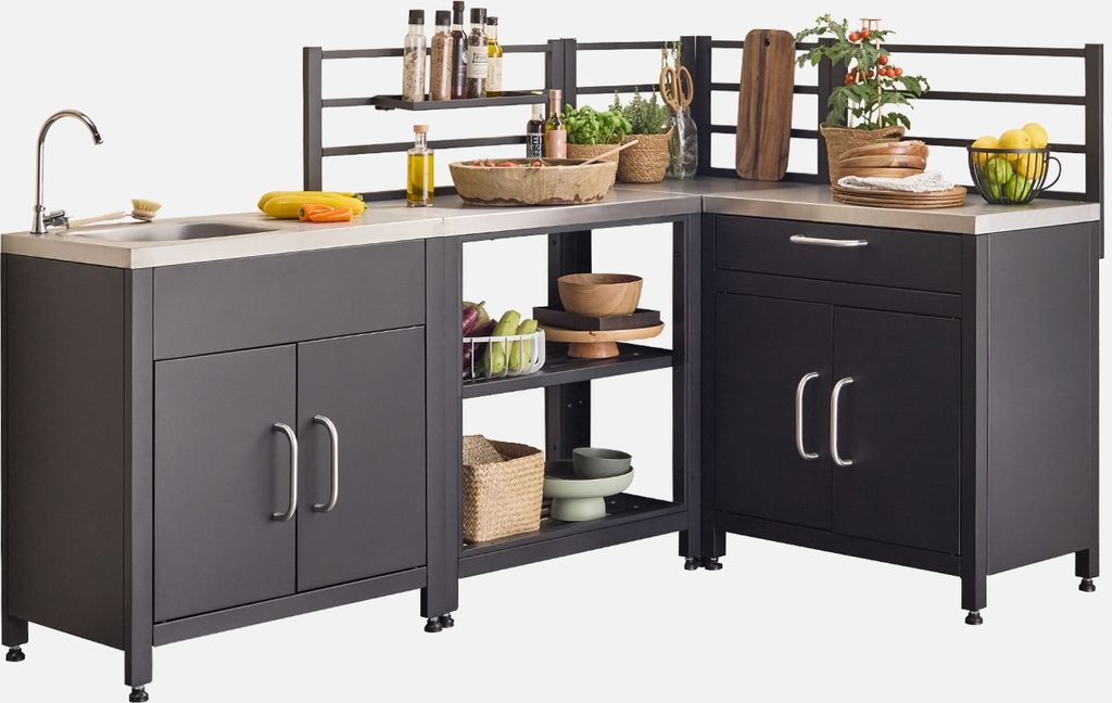 An outdoor kitchen unit with a sink, countertop, and storage cabinets.