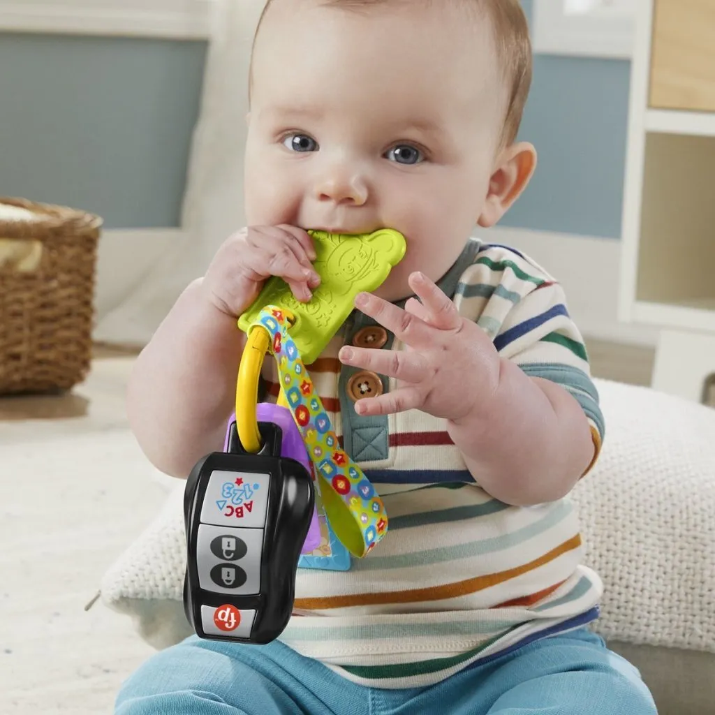 Porte-clés Interactif Multilingue avec Miroir et Anneau de Dentition