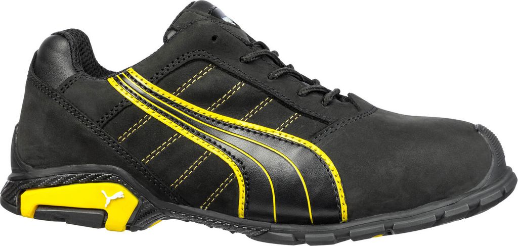 A black and yellow Puma safety shoe is shown against a white background.