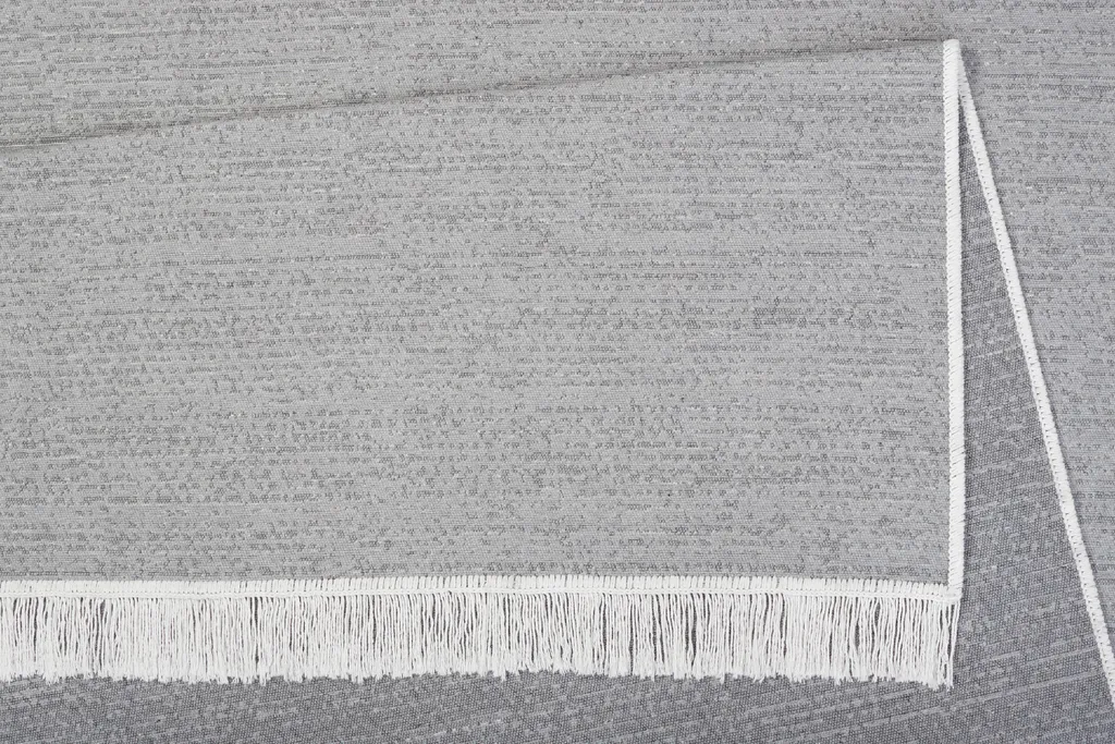 Tapis AZTECA gris uni 120 x 170 cm - Design épuré avec franges