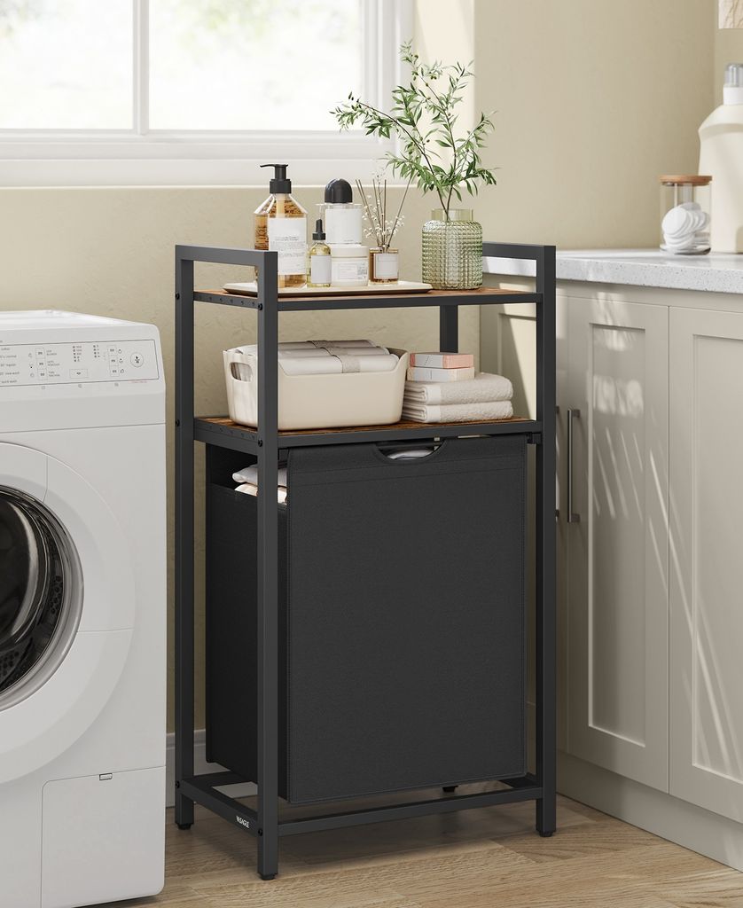 A laundry cart with a hamper and shelves is placed next to a washing machine in a laundry room.