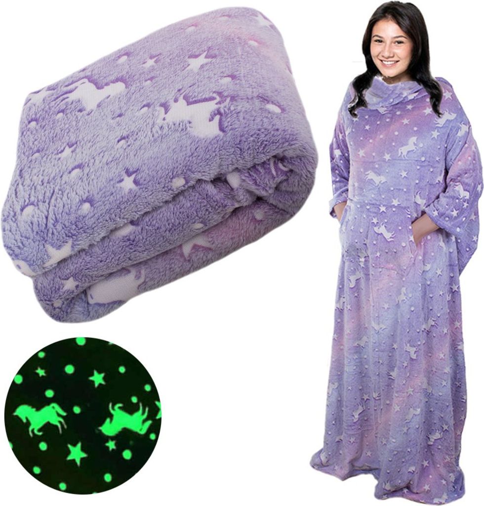 A collage showing a folded blanket with a unicorn and star pattern and a woman wearing a blanket with sleeves with the same pattern.