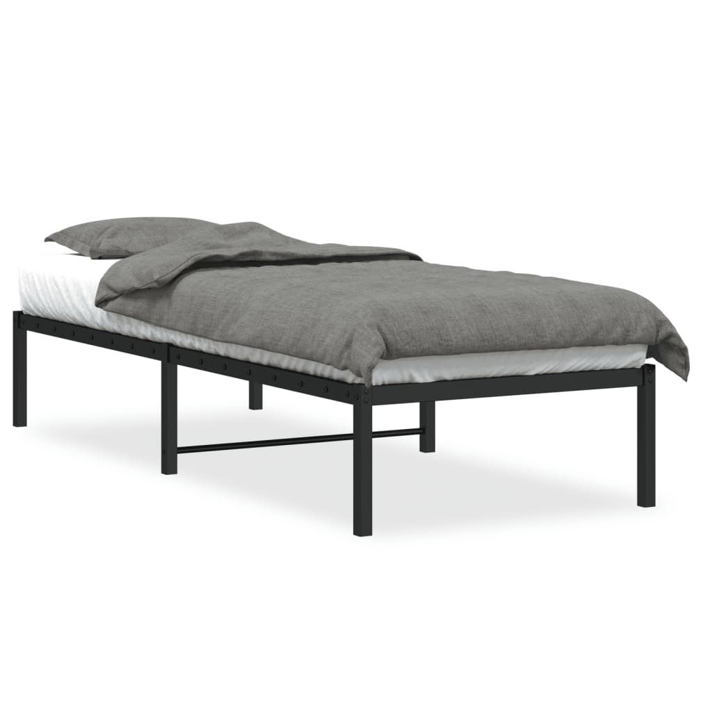 A black metal bed frame with a mattress and gray bedding, shown from a side angle against a white background.