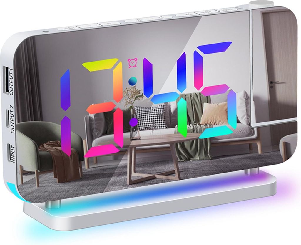 A digital alarm clock with a mirrored surface displaying the time and a colorful reflection of a living room.