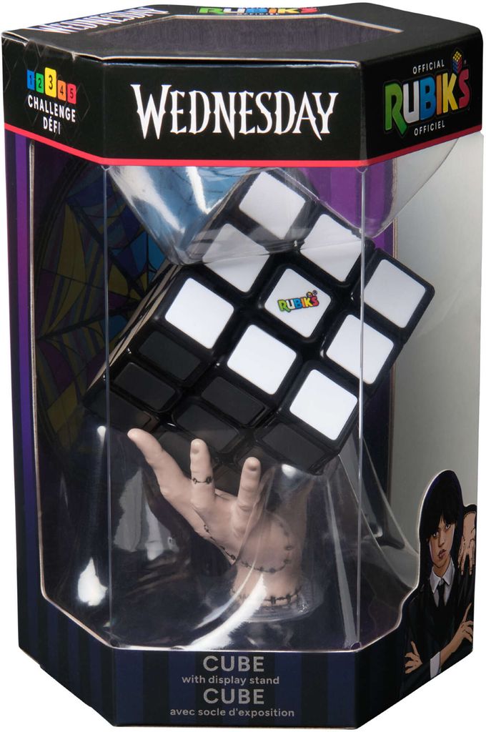 A Rubik's Cube themed around the show Wednesday, presented in its retail packaging.