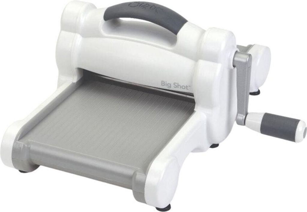 A white Sizzix Big Shot die-cutting and embossing machine is shown from a diagonal front-side view against a white background.